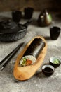 Sushi Burrito with salmon, cucumber, bell pepper and cream cheese Royalty Free Stock Photo