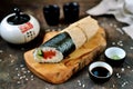 Sushi Burrito with salmon, cucumber, sweet pepper and cream cheese Royalty Free Stock Photo