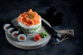 Sushi cake with lightly salted salmon, nori and avocado.