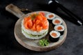 Sushi cake with lightly salted salmon, nori and avocado.