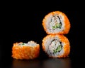 Sushi California Roll on black background Royalty Free Stock Photo