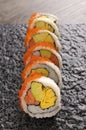 Sushi California roll on black plate Royalty Free Stock Photo