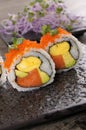 Sushi california roll on black plate Royalty Free Stock Photo