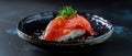 sushi centerstage, garnished above Royalty Free Stock Photo