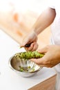 Sushi chef grating fresh Wasabi, Fresh wasabi root prepare for n Royalty Free Stock Photo