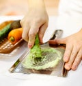 Sushi chef grating fresh Wasabi, Fresh wasabi root prepare for n Royalty Free Stock Photo