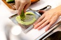 Sushi chef grating fresh Wasabi, Fresh wasabi root prepare for n Royalty Free Stock Photo