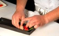 Sushi chef making tuna and salmon sushi nigiri