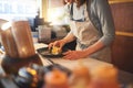 Sushi chef, restaurant and ready in kitchen with hands, service or plate on table, job or catering. Small business, fast Royalty Free Stock Photo