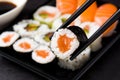 Sushi and chopstick on sushi pack background