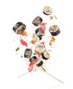 Sushi with chopsticks chaotically hovering in the air on white background