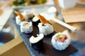Sushi and chopsticks. Food detail concept. Royalty Free Stock Photo