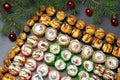 Sushi on christmas background. Christmas tree with toys and sushi rolls set for menu and advertising. Christmas pattern with food Royalty Free Stock Photo