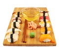 Sushi composition over cutting board