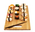 Sushi composition over cutting board