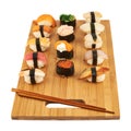 Sushi composition over cutting board