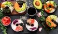 Sushi donuts on a dark background. Hybrid trend food