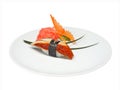 Sushi with eel and pickled ginger and wasabi on white round plate