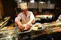 Japanese chef preparing a plate of sushi. Shibuya. Tokyo. Japan