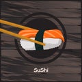 Sushi, Japanese food on a wooden background. Royalty Free Stock Photo