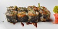 Sushi large set with unagi sauce served on white plate with pickled ginger and wasabi Royalty Free Stock Photo