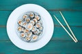 Sushi maki gunkan roll plate and chopsticks Royalty Free Stock Photo