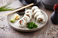 Sushi maki rolls Philadelphia with salmon, creamy cheese and avocado on a plate with chopsticks, soy sauce, wasabi and Royalty Free Stock Photo