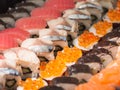 Sushi and maki rolls with shime saba, salmon, tuna and ikura.