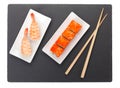 Sushi maki and shrimp sushi on black stone Royalty Free Stock Photo