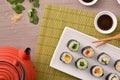 Sushi maki on white plate with oriental decoration top Royalty Free Stock Photo