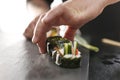 Sushi master preparing sushi in Japanese restaurant Royalty Free Stock Photo