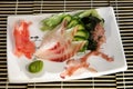 Sushi menu, cutting fish, seaweed and cucumber Royalty Free Stock Photo