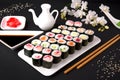 Sushi menu. Japanese food. Set of maki with salmon, tuna, chuka, cucumber, avocado, cheese, eel, shrimp, crab stick, tobiko caviar Royalty Free Stock Photo