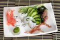 Sushi menu scallop rolls with cucumber and seaweed Royalty Free Stock Photo