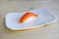 Sushi, nigiri, sake a dish of the traditional Japanese cuisine cooked from rice and a salmon. Royalty Free Stock Photo