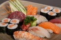 Sushi plate and assorted sashimi. Isolated image