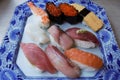 Sushi on plate at Tsukiji fish market in central Tokyo, Japan Royalty Free Stock Photo