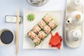 Sushi platter isolated on white background. Japanese food restaurant delivery - maki california rolls big party set, top Royalty Free Stock Photo