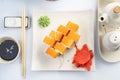 Sushi platter isolated on white background. Japanese food restaurant delivery - maki california rolls big party set, top Royalty Free Stock Photo