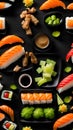 Sushi platter with soy sauce, ginger and wasabi on a black background
