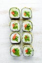 Sushi roll with avocado, cucumber and tomato. Japanese cuisine.