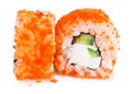 Sushi roll California with crab meat, avocado, cucumber inside and masago smelt roe outside isolated on white background. Royalty Free Stock Photo