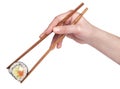 Sushi - Roll with chopsticks isolated Royalty Free Stock Photo