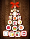 Sushi roll Christmas tree with red bow on wooden table background.