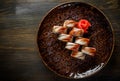 Sushi roll with cream cheese and eel in plate on wooden table Royalty Free Stock Photo