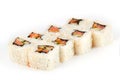 Sushi Roll - Maki Sushi made of Smoked Eel, Cream Cheese, Sesame, Salmon and Deep Fried Vegetables, isolated on white background Royalty Free Stock Photo