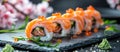 Sushi Roll on Black Plate Royalty Free Stock Photo