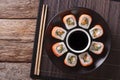 Sushi roll philadelphia and soy sauce, closeup. Horizontal top v