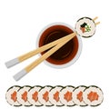 Sushi roll with plate of soy