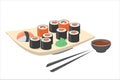 Sushi roll on the plate with wasabi and black chopstick.